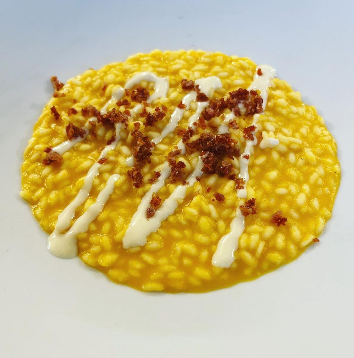 RISOTTO ALLA ZUCCA, COTECHINO SGRANATO E SALSA AL MONTE VERONESE